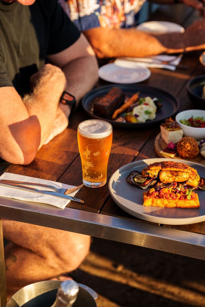 Featured image for “Our brews are on tap at the PumpHouse Kununurra !  Soak in the views, enjoy a delicious meal, and refresh with a crisp, cold Spinifex brew.”